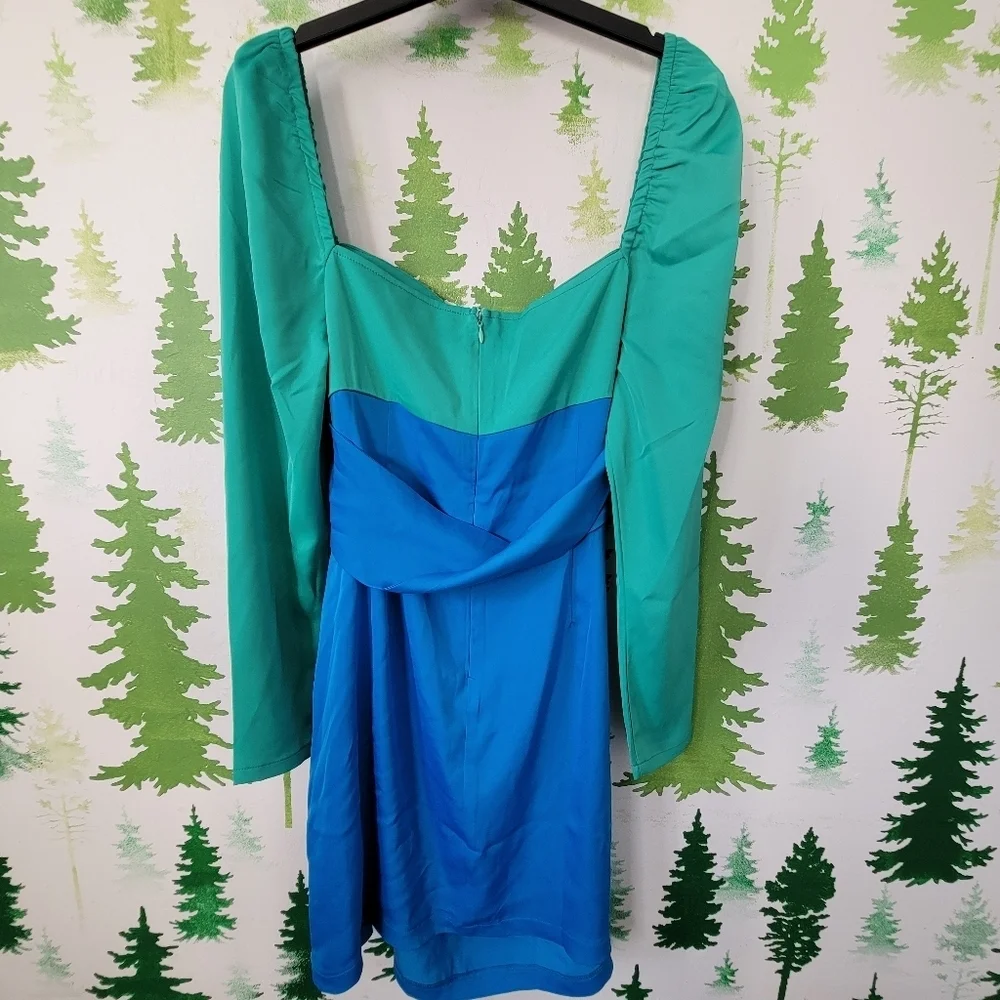 The Frolic Twist Front Satin Shift Mini Dress.